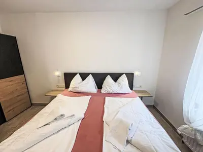 Ein Bett oder Betten in einem Zimmer der Unterkunft Apartment Sarah by Interhome