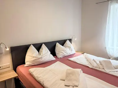 Ein Bett oder Betten in einem Zimmer der Unterkunft Apartment Sarah by Interhome