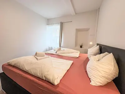 Ein Bett oder Betten in einem Zimmer der Unterkunft Apartment Sarah by Interhome