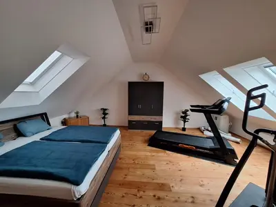 Ein Bett oder Betten in einem Zimmer der Unterkunft Ferienwohnung Kampesberg
