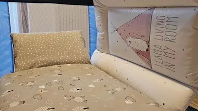 Ein Bett oder Betten in einem Zimmer der Unterkunft Pfleger Ranch am Schönegg Gut