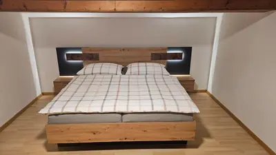 Ein Bett oder Betten in einem Zimmer der Unterkunft Pfleger Ranch am Schönegg Gut