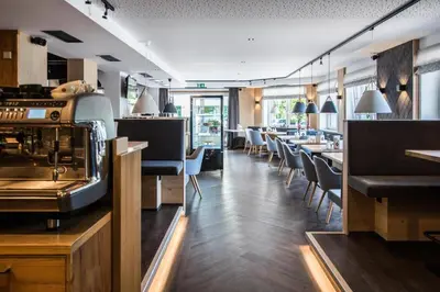 Ein Restaurant oder anderes Speiselokal in der Unterkunft Attergau Rooms - Self Check-In