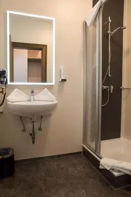 Ein Badezimmer in der Unterkunft Attergau Rooms - Self Check-In