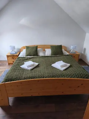 Ein Bett oder Betten in einem Zimmer der Unterkunft Landcafe Kauder