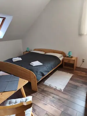 Ein Bett oder Betten in einem Zimmer der Unterkunft Landcafe Kauder