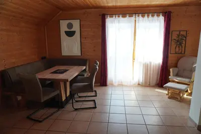 Ein Sitzbereich in der Unterkunft Apartment Zehentmoar