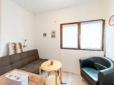 Ein Sitzbereich in der Unterkunft Wohnung Tauplitz nahe Skilift & Pisten