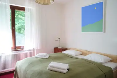 Ein Bett oder Betten in einem Zimmer der Unterkunft Landhaus mit Panoramablick & Terrasse
