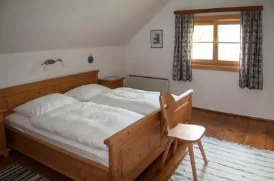 Ein Bett oder Betten in einem Zimmer der Unterkunft Hütterhof - Ferienhaus