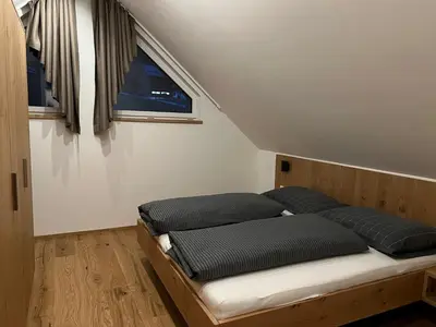 Ein Bett oder Betten in einem Zimmer der Unterkunft Ferienhaus Korda