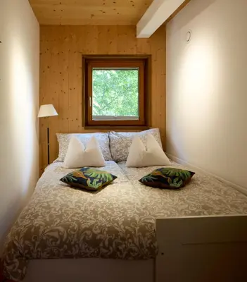 Ein Bett oder Betten in einem Zimmer der Unterkunft Mountains & Lake Boutique Apartment