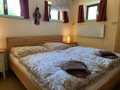Ein Bett oder Betten in einem Zimmer der Unterkunft Kleine Ahornau