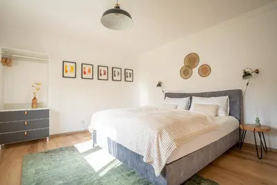 Ein Bett oder Betten in einem Zimmer der Unterkunft BacherlHouse - Apartment Ager