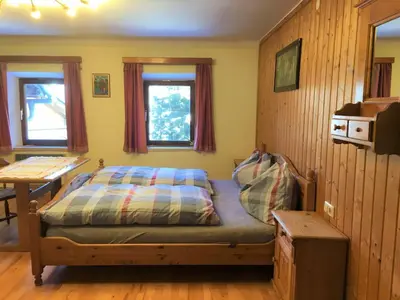 Ein Bett oder Betten in einem Zimmer der Unterkunft Farmhouse in St Johann im Pongau with Sauna