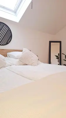 Ein Bett oder Betten in einem Zimmer der Unterkunft Ferienhaus - Hoamathaus