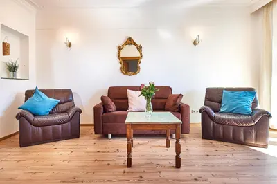 Ein Sitzbereich in der Unterkunft Apartments Radstadt