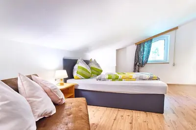 Ein Bett oder Betten in einem Zimmer der Unterkunft Apartments Radstadt