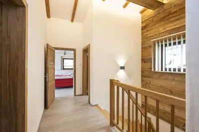 Ein Bett oder Betten in einem Zimmer der Unterkunft AAF - Familien-Chalet Gipfelblick