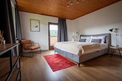 Ein Bett oder Betten in einem Zimmer der Unterkunft BacherlHouse - Apt Sickingerbach