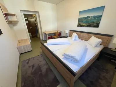 Ein Bett oder Betten in einem Zimmer der Unterkunft Eva