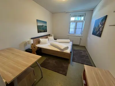 Ein Bett oder Betten in einem Zimmer der Unterkunft Eva