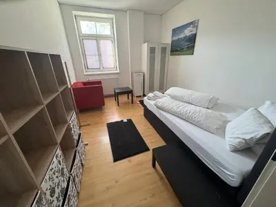 Ein Bett oder Betten in einem Zimmer der Unterkunft Eva