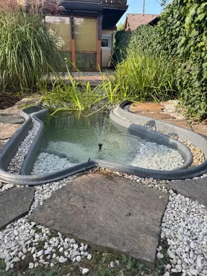 Ein Garten an der Unterkunft Ferienwohnung Top 5