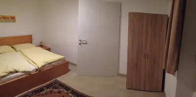 Ein Bett oder Betten in einem Zimmer der Unterkunft Villa Stadlmann