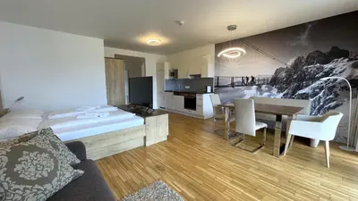 Ein Bett oder Betten in einem Zimmer der Unterkunft Apartmány ALPINE LIVING Haus - Schladming