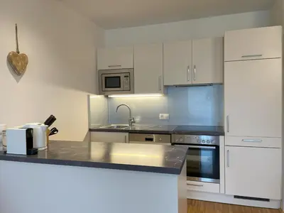 Küche/Küchenzeile in der Unterkunft Apartmány ALPINE LIVING Haus - Schladming