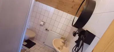 Ein Badezimmer in der Unterkunft Haus Nandita