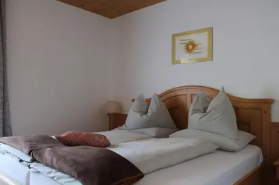 Ein Bett oder Betten in einem Zimmer der Unterkunft Ferienhotel Samerhof