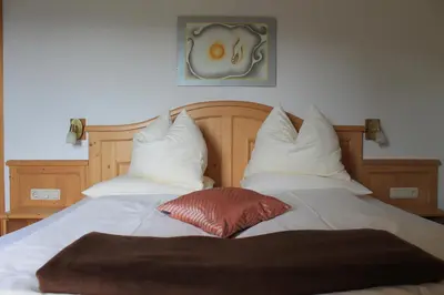 Ein Bett oder Betten in einem Zimmer der Unterkunft Ferienhotel Samerhof