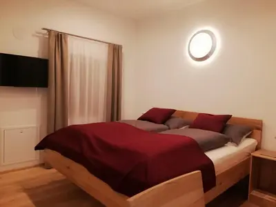 Ein Bett oder Betten in einem Zimmer der Unterkunft Schranklmühle
