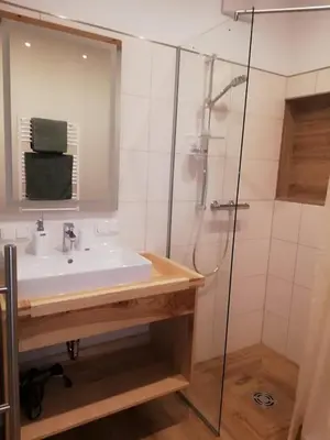 Ein Badezimmer in der Unterkunft Schranklmühle