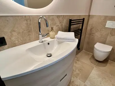 Ein Badezimmer in der Unterkunft Juwel 02