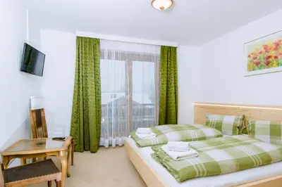 Ein Bett oder Betten in einem Zimmer der Unterkunft Ferienhaus Kuchelberg