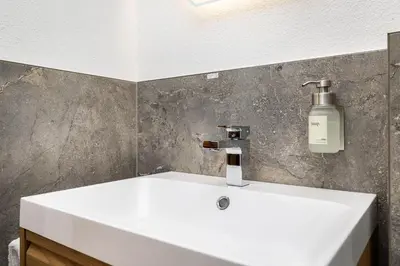 Ein Badezimmer in der Unterkunft S Apartment