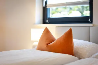 Ein Bett oder Betten in einem Zimmer der Unterkunft S Apartment