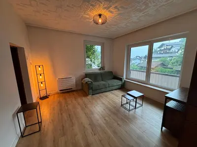 Ein Sitzbereich in der Unterkunft Ferienwohnung Fuchs