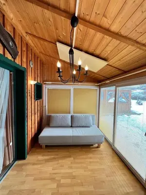 Ein Bett oder Betten in einem Zimmer der Unterkunft Kreischberg Ferien Chalet
