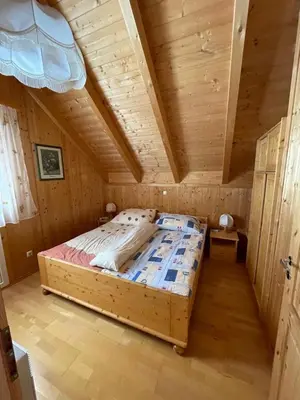 Ein Bett oder Betten in einem Zimmer der Unterkunft Kreischberg Ferien Chalet