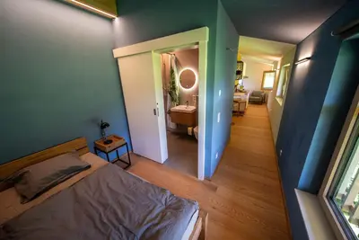 Ein Bett oder Betten in einem Zimmer der Unterkunft Studio Terra Salzburg Eco-suite