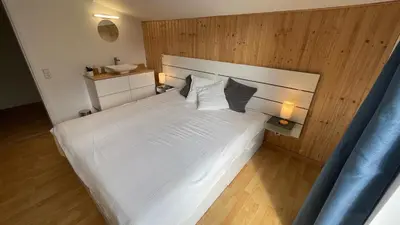 Ein Bett oder Betten in einem Zimmer der Unterkunft Tauplitz-Grimming-View Apartment mit Sauna