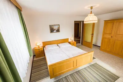 Ein Bett oder Betten in einem Zimmer der Unterkunft Johannes Gusterer