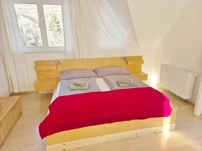 Ein Bett oder Betten in einem Zimmer der Unterkunft Kreischberg Superior with Sauna