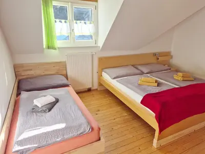 Ein Bett oder Betten in einem Zimmer der Unterkunft Kreischberg Superior with Sauna