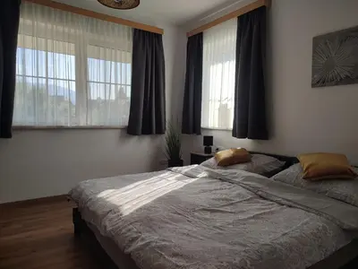Ein Bett oder Betten in einem Zimmer der Unterkunft Fewo Puxberg