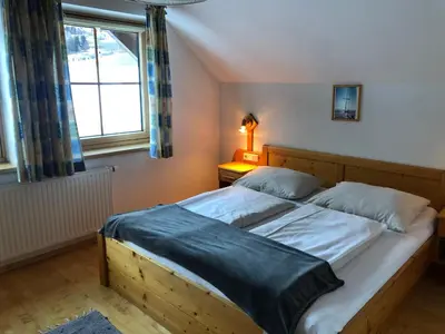 Ein Bett oder Betten in einem Zimmer der Unterkunft Ferienwohnung Hubenbauer